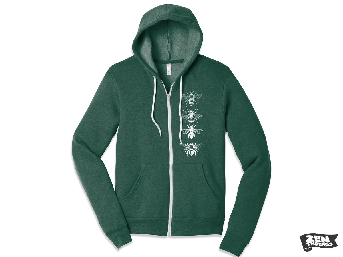 May include: A dark green zippered hoodie with a white graphic of four bees on the front. The bees are arranged vertically in a line.